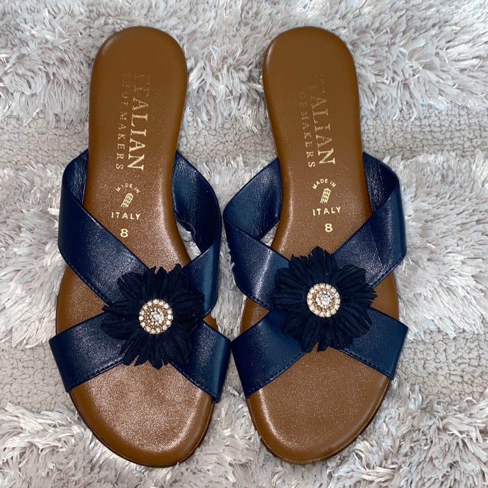 Brown and blue Italian Shoemakers slip on sandals.